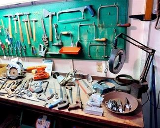 Antique tool shed - lots of antique & vintage tools.  lots of hammers, planes, chisels, files, saws, nails, screws, screwdrivers, pliers, bit sets, antique toolboxes, & more.
