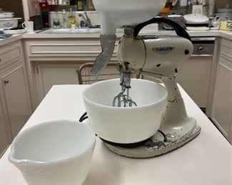 Antique Hamilton Beach mixer with juicing attachment and milk glass bowls. In working condition. 