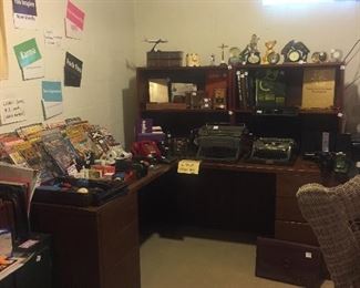 L shaped office desk and tons of office supplies and decor