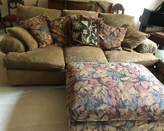 Pine Tree Barn three cushion upholstered sofa with coordinating oversize chair and ottoman.