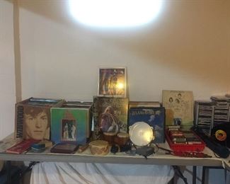 Four boxes of vinyls (lots of rock and roll), 45's, CD's, DVD's, VHS.