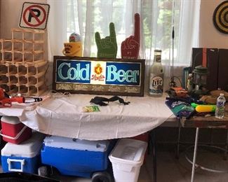 Beer signs, mini corn hole game, coolers, misc. garage items.