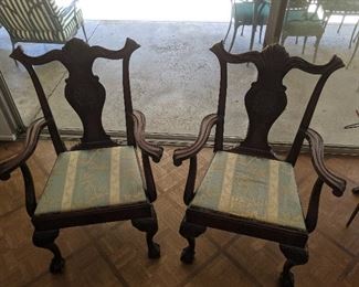 Pair of antique chairs with claw feet