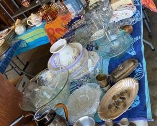 Assorted decorative serving pieces and glassware