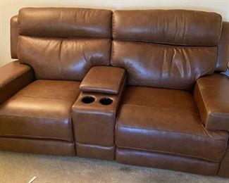 Leather powered motion loveseat