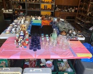 Assorted decorative serving pieces and glassware