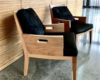 Flexform
Pr hardwood armchairs 
hide cushions
attributed to Antonio Citterio
27” x 25.5” x 32”h   seat h 16”
SOLD