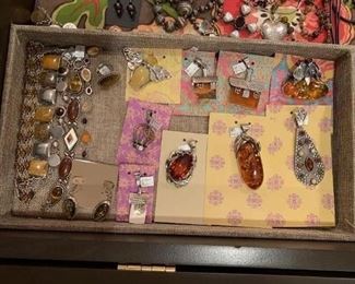Sterling silver jewelry - newer pieces with amber and other stones on the left and new pieces from Russia with amber on the right. All 50% off!