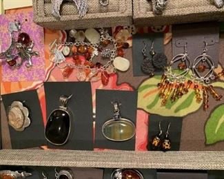 Sterling silver jewelry - the amber octopus set is new from Russia, the charm bracelet is by Sajen and the leopard print earrings are made by us. All 50% off!