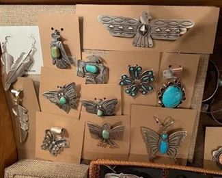 Sterling silver Native American jewelry including Navajo and Zuni. The silver feather set is by Navajo Chris Charley. All 50% off!