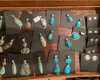 Sterling silver pendants by Native American artists including Thane DeLeon with genuine turquoise where applicable. All 50% off!