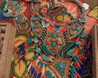 Statement necklaces from Tibet with genuine stones. The metal is silver with a touch of brass mixed in to retard tarnishing. They are all beautiful but the one with the fringe is amazing. All 50% off!