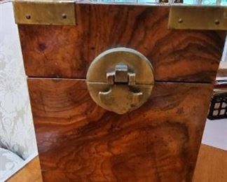 Wooden box with brass details