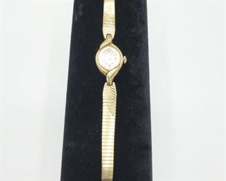 This is a beautiful, dainty lady's watch. Back labeled "Bulova NO., 10K R.G.P. Bezel, Stainless Steel Back". https://ctbids.com/#!/description/share/974334