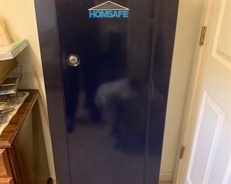 This is a standing gun safe made by HomeSafe. It has two locking mechanisms that lock with barrel keys that are included. The safe is in good condition and has an upper shelf for ammo and pistol storage 21x10x55 https://ctbids.com/#!/description/share/974514