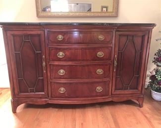 American Drew sideboard for storing silverware and dishes. The top marble piece is removable. There is an included silverware storage bag and the entire piece looks like new. 66x24x41" Drawers: 17x25x4" Cabinets: 17x16x16" https://ctbids.com/#!/description/share/974544