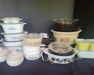 
Visions baking dishes and Pyrex glass baking pans. Beautiful Pyrex Black Tulip Cinderella casserole dish with holder is missing lid but still sought out by collectors of vintage Pyrex. There are also cornflower blue and other prints as well. https://ctbids.com/#!/description/share/974516