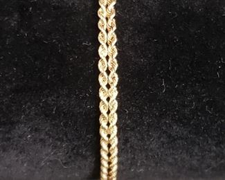 This very beautiful 14k gold bracelet uses two ropes to subtley create heart shapes along it's length. The bracelet is stamped 14K and weighs 6 grams. There is also a patent number that is visible in the photos. It is approximately 7.5" long. https://ctbids.com/#!/description/share/974294