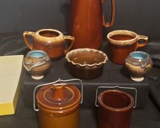 Hull stoneware and coordinating pieces. Lot also includes a rectangular dish by Haeger. Pitcher is slightly over 10" tall and has a little adhesive residue showing in the photos. https://ctbids.com/#!/description/share/974298