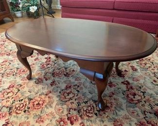 Beautiful mahogany coffee table with a decorative carved base. It’s in good condition and measures 36x24x18". https://ctbids.com/#!/description/share/974540
