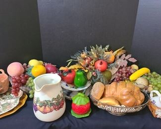 Grapes, apples, peaches, pomegranate and just like the bread, they are not edible. Two glass bowls and a porcelain cornucopia full of juicy looking fruit. https://ctbids.com/#!/description/share/974566
