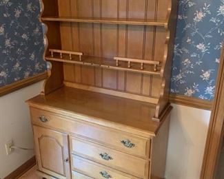 Maple hutch made by Cochrane Furniture Co. features 4 drawers and a small cabinet for linen storage. The top piece is detachable.  Measurements 43x10x69” Drawer: 36x15x4” 23x15x4” Cabinet: 16x14x18”. https://ctbids.com/#!/description/share/974571
 