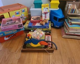 Little Tikes truck, Barbie camper, puzzles though not sure if all the pieces are there. There are games and coloring books. Wood monkey goes up and down string. Classic disney books and coloring books. https://ctbids.com/#!/description/share/974465