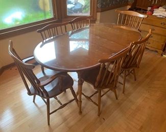 Nice maple kitchen table. It’s sturdy and comes with 4 brace back chairs and 2 captain chairs. They all have some minor signs of wear on them.  Table 68x38x30” 58x38x30” no leaf, Chairs: 26x20x37”. https://ctbids.com/#!/description/share/974578