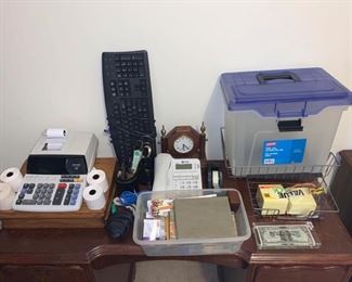 This is a collection of office supplies that includes a phone, calculator, clock, keyboard, mouse and more. Desk not included. https://ctbids.com/#!/description/share/974479