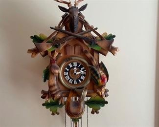 Beautiful working German cuckoo clock. 12 x 7 x 17 48 inch chain length https://ctbids.com/#!/description/share/974588