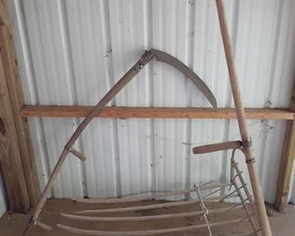 Both are in good working condition. Rake measures approximately 55" to top of handle and rake is 45" x 25". There is one wooden tine that is a few inches shorter than others. Scythe is approximately 55" tall and blade is 20" long. https://ctbids.com/#!/description/share/974490