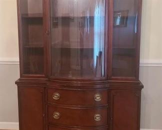 Beautiful mahogany Drexel federal style china cabinet. The cabinet features a full glass front to show off things inside. On the bottom are two cabinets with two shelves and three drawers. China Cabinet measures 49" x 15" x 70". https://ctbids.com/#!/description/share/974616