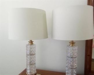 Set of matching iridescent table lamps with brass accents. Measures 29" tall with 6" square base. Both are in working condition. https://ctbids.com/#!/description/share/981186
