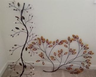 2 metal wallings that can be hung in different positions, depending on your space. The leaf one with crystals is 40" x 15". The other is 35" x 30". https://ctbids.com/#!/description/share/981192
