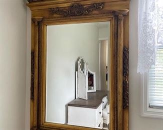 Very large ornate mirror with wood frame. Mirror measures 35 x 52". https://ctbids.com/#!/description/share/981196