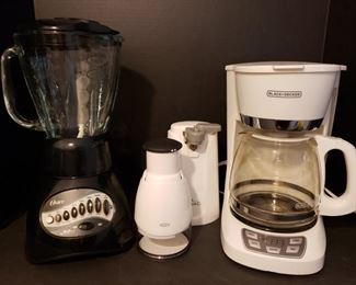 Includes Oster blender, Rival can opener and Black and Decker coffee maker. Largest measures 15"H x 7"L and smallest measures 7 1/2"H x 4"L. https://ctbids.com/#!/description/share/981209