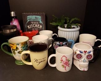 Includes coffee mug collection, plant and wall plaque. Largest measures 9 1/2"H x 7"L and smallest measures 4"H x 5"L. https://ctbids.com/#!/description/share/981212