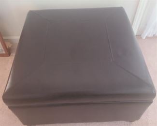 
Dark brown vinyl ottoman is in great condition. The top opens up for a two part storage area. The ottoman measures 30" x 30" x 18". https://ctbids.com/#!/description/share/981217