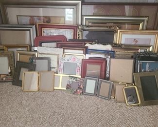 Frames of various sizes and styles, includes plastic, wood and metal. https://ctbids.com/#!/description/share/981224