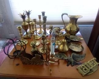 Vintage brass candlesticks, pitcher, ducks, bells and more. Tallest candlestick is 9" and pitcher is 8". https://ctbids.com/#!/description/share/981237