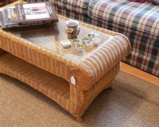 wicker coffee table, books