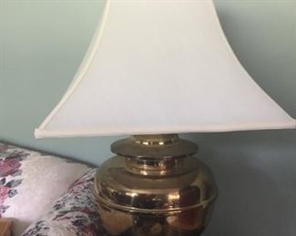 Matching brass lamps.
