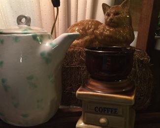 A ceramic coffee pot, marmelade kitty on a mini bale of straw and a delightful coffee-inspired planter or holder for sweetener. 