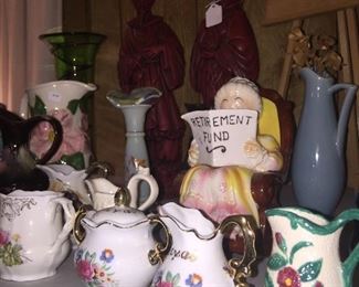 A wonderful assortment of vases, some of which highlight travel destinations. 