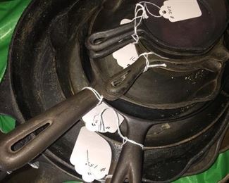  Cast iron skillets by Griswold, Favorite, Lodge and other manufacturers in a variety of sizes. 