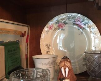 A lovely Homer Laughlin plate with posies, vintage tin match holders, pressed glass and a fun-loving walrus. 