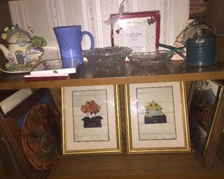 Framed art and glassware add personality to most any room. 