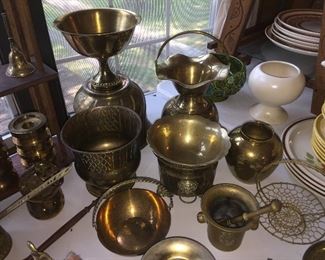 Brass vessels and decorative pieces.