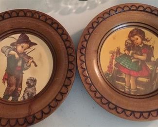 German Hummel designs in decorative wood frames. 