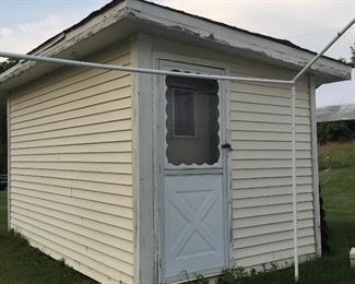 Building, about 8-by-12 foot, available. Buyer must remove structure.